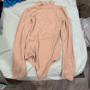 nude turtleneck body suit